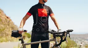 Cyclist standing with his bike - Outdoors